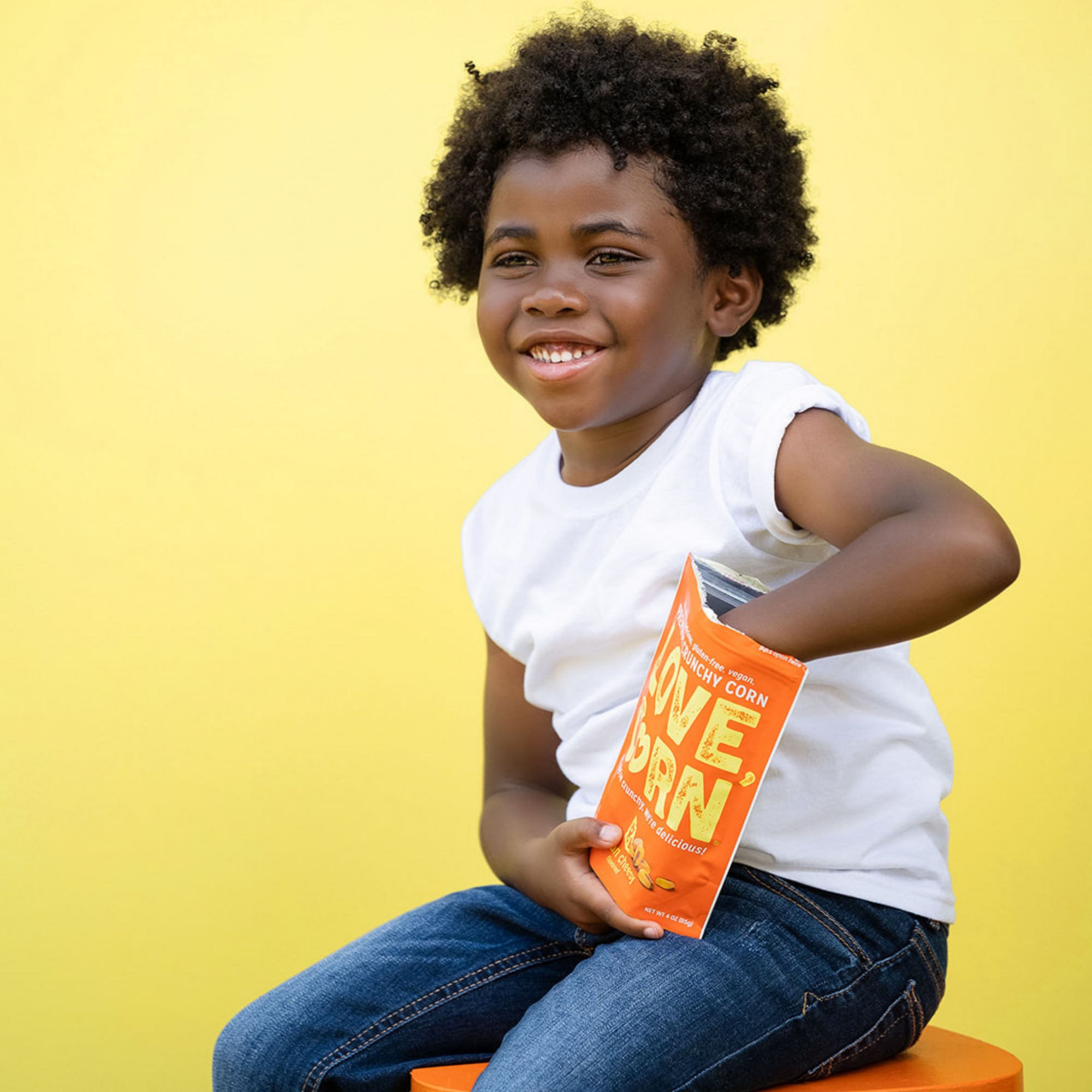 African American kid enjoying Love Corn